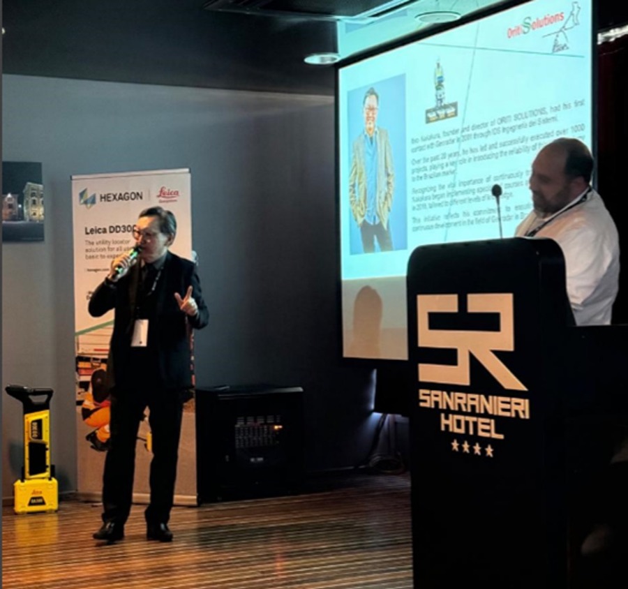 Rodrigo Fukuhara apresentando a experiência da ORITI Solutions com georadar em evento internacional da Hexagon e Leica Geosystems